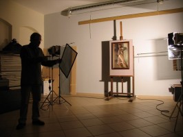 Photographer A. Lukšėnas prepares to photograph an exhibit. © R. Strolytė